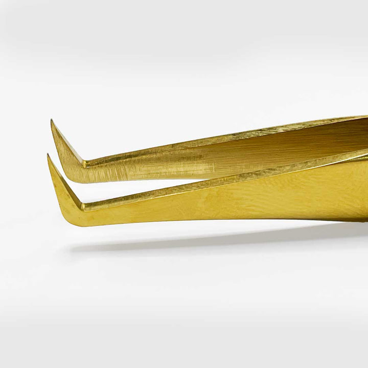 Booty Call volume lash tweezers — angled detail view